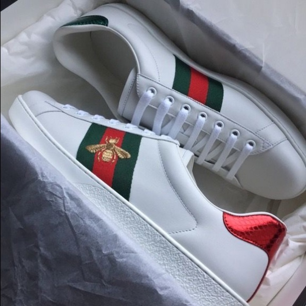 Brand new Gucci sneakers. Never worn. Come with box, dust bag and receipt.
